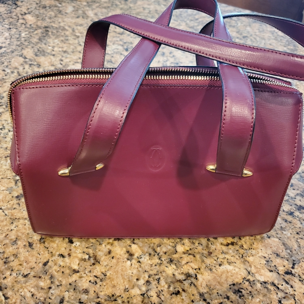 Must de Cartier Bordeaux bag